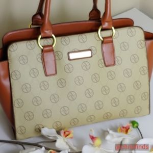 Adrienne Vittadini leather logo purse bag